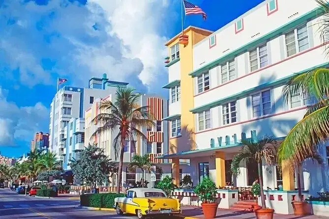 Pastel Art Deco hotels and a vintage taxi along Ocean Drive