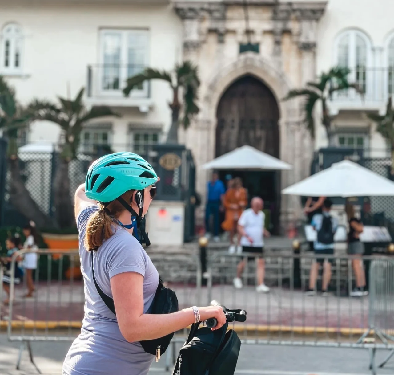 A Segway rider outside an Art Deco building