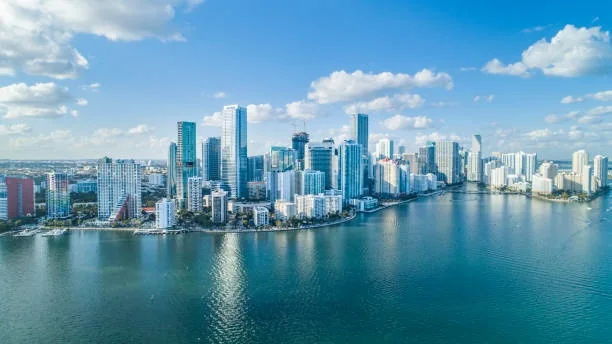 The Miami waterfront skyline across blue bay water