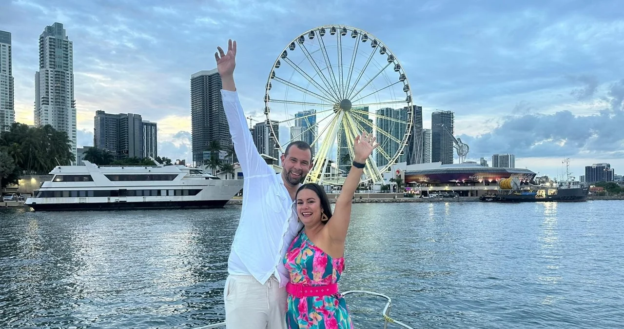 Passenger on a small boat near the Miami waterfront observation wheel
