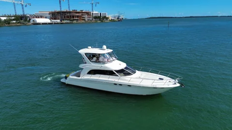 White motor yacht on Miami bay water